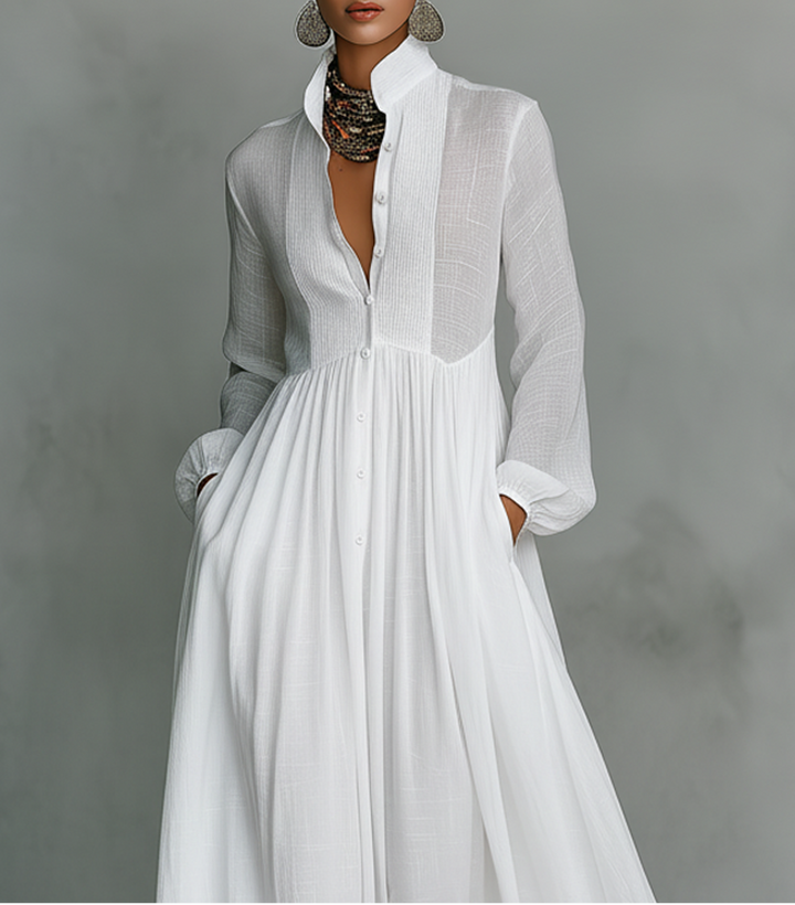 Vestido maxi blanco fluido y cómodo para mujer. Diseño minimalista y elegante, ideal para un estilo atemporal de verano.