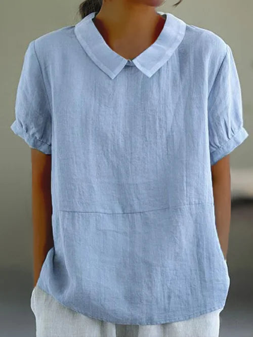 Blusa de mujer suelta y cómoda con cuello alto, perfecta para atuendos elegantes o casuales de verano.