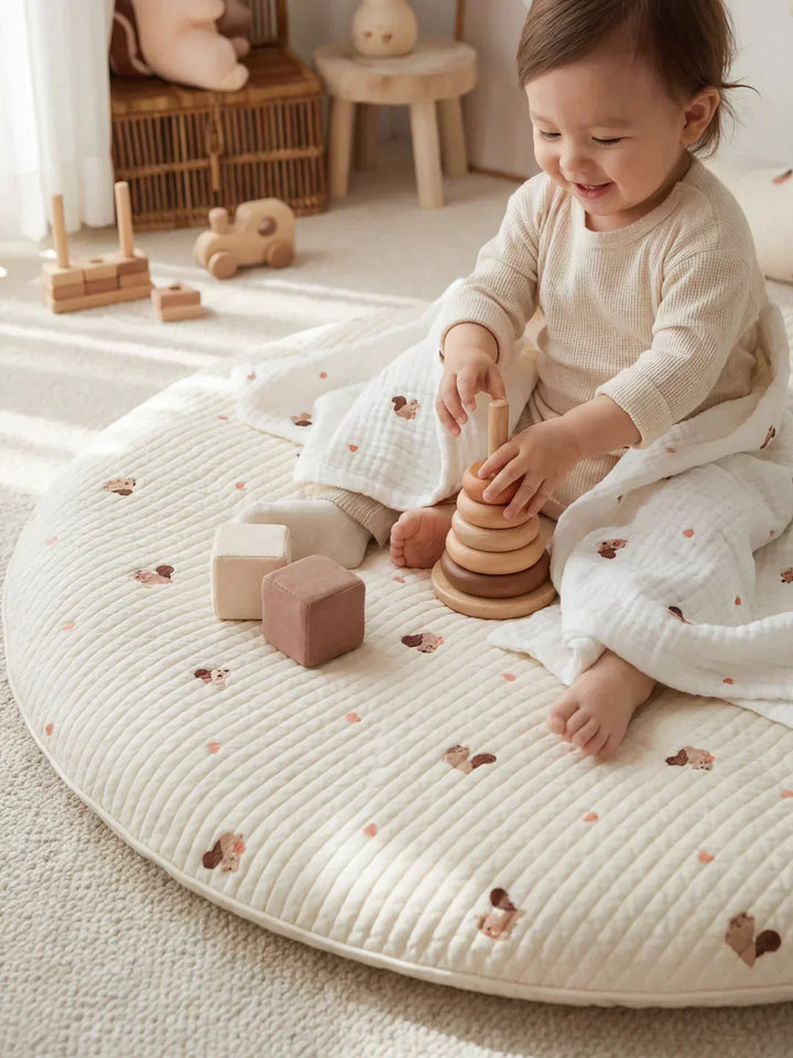 Tapete de juegos de algodón para bebé, circular y acolchado, garantiza seguridad y diversión infantil.