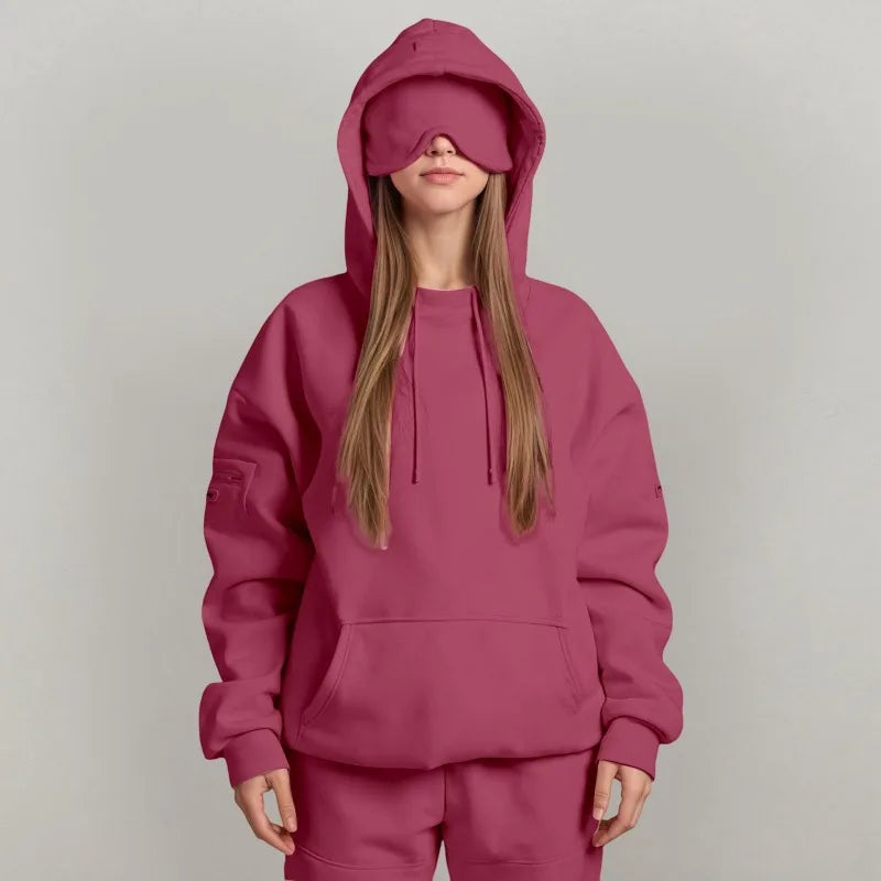 Sudadera de viaje para mujer, ideal para escapadas. Capucha y máscara integradas.