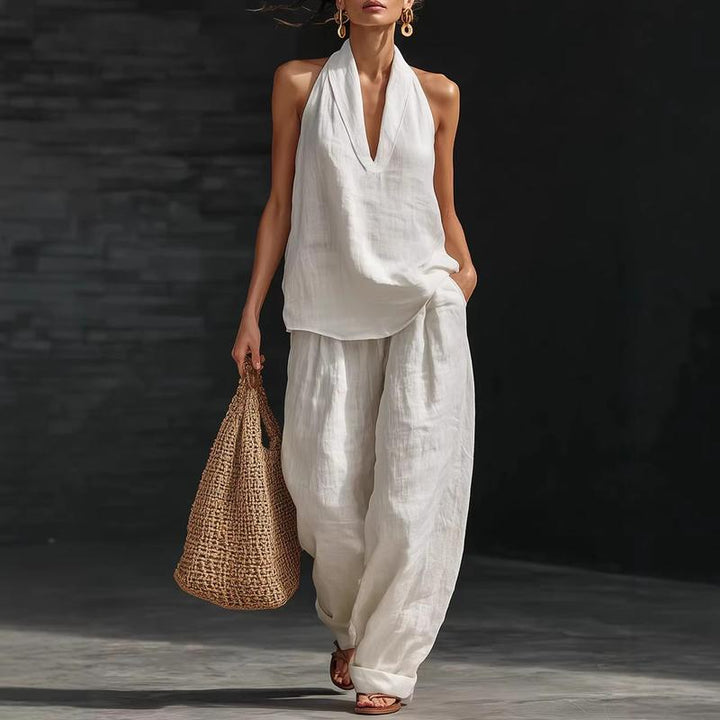 Conjunto de lino casual-chic para mujer, blusa y pantalón ancho. Estilo versátil para el día a día veraniego.
