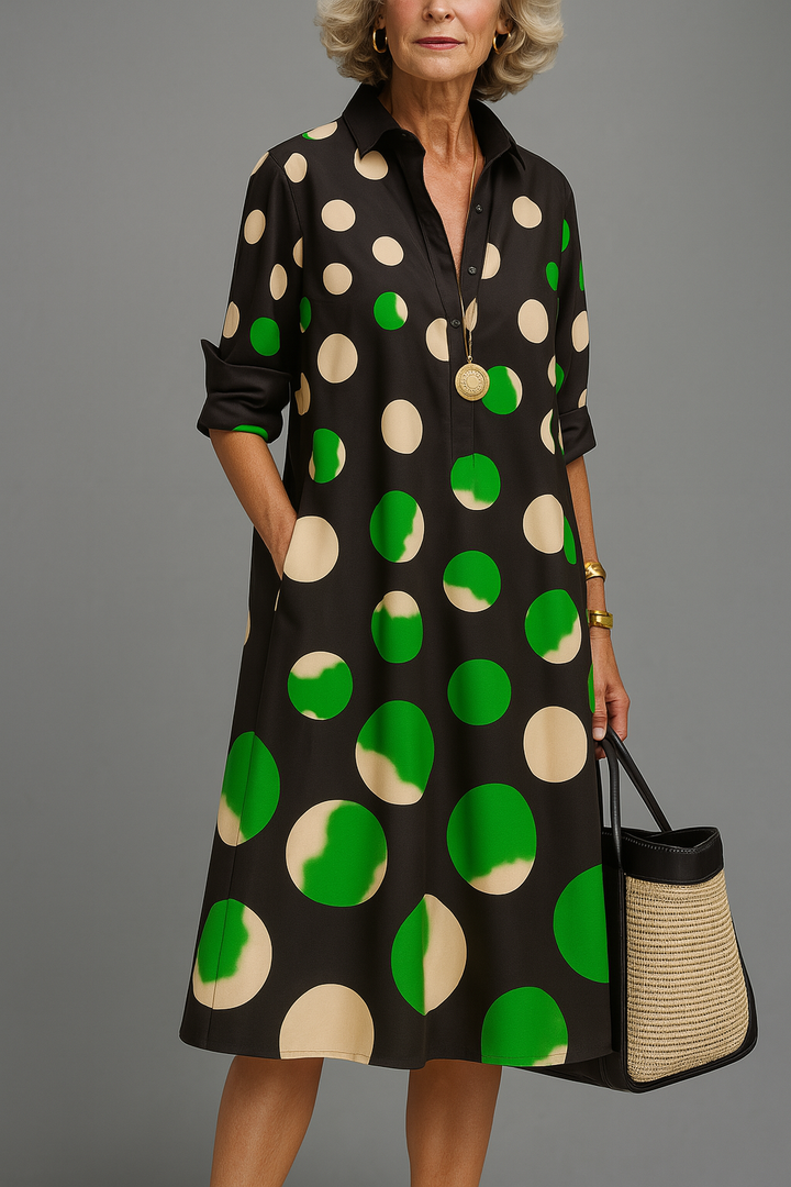Vestido midi camisero para mujer con lunares. Diseño negro, elegante y casual, ideal para el verano.