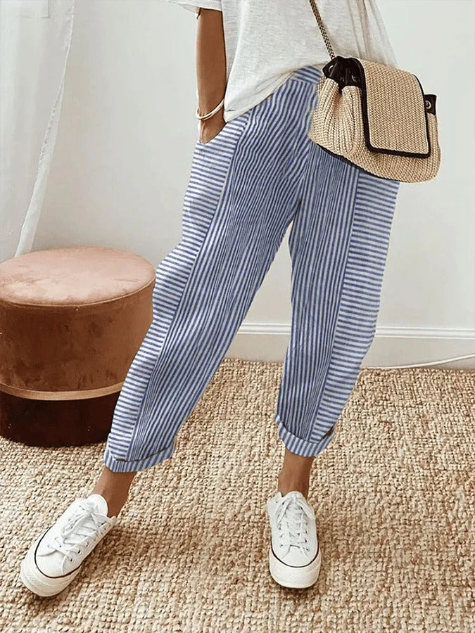 Pantalón casual de mujer, lino a rayas con diseño fluido. Cintura ajustable, perfecto para un look relajado y elegante de verano.