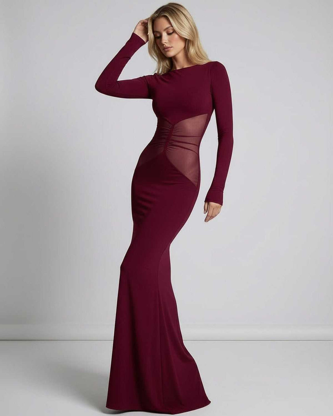 Vestido de fiesta maxi burdeos, con un estilo elegante y panel de malla, ideal para la mujer que busca destacar.