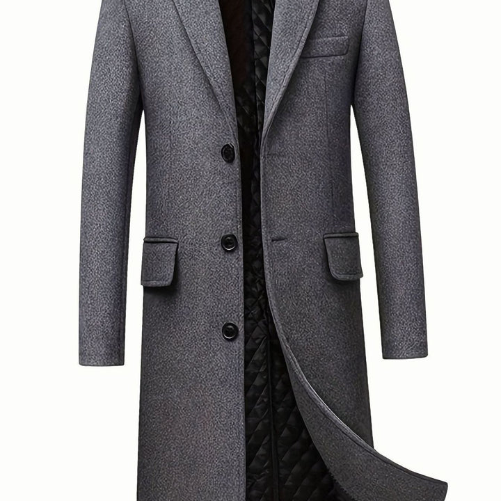 Abrigo largo de lana gris para hombre con botones. Elegancia y calidez invernal, ideal para ropa exterior formal.
