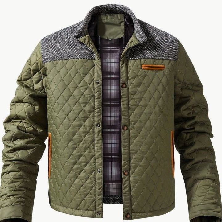 Chaqueta hombre acolchada gris bicolor, cuello alto, broches frontales. Ideal otoño-invierno.