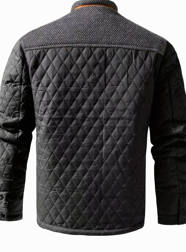 Chaqueta bicolor acolchada, cierre broches. Abrigo esencial para hombre en otoño.