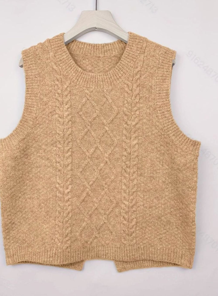 Elegante chaleco de punto trenzado de mujer. Diseño sin mangas, cuello redondo. Perfecto para primavera.