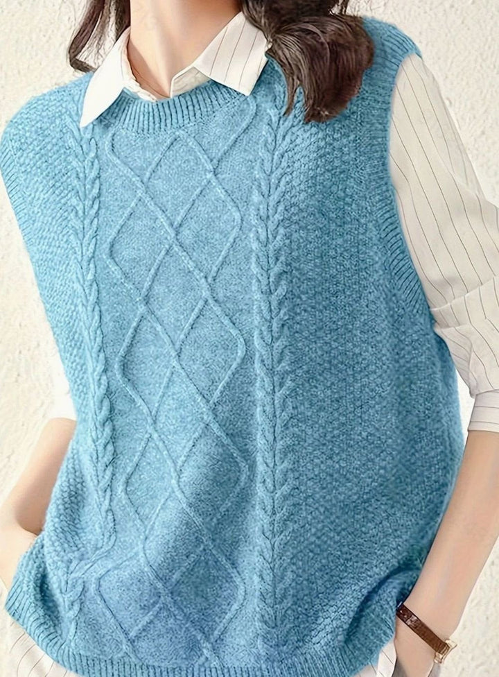 Chaleco de punto trenzado de mujer, diseño sin mangas. Cuello redondo, elegancia casual para cualquier día.