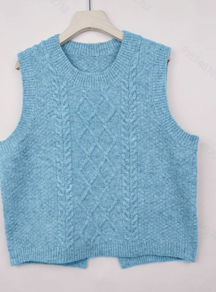 Chaleco de punto trenzado para mujer. Un básico versátil, sin mangas, ideal para moda de primavera.