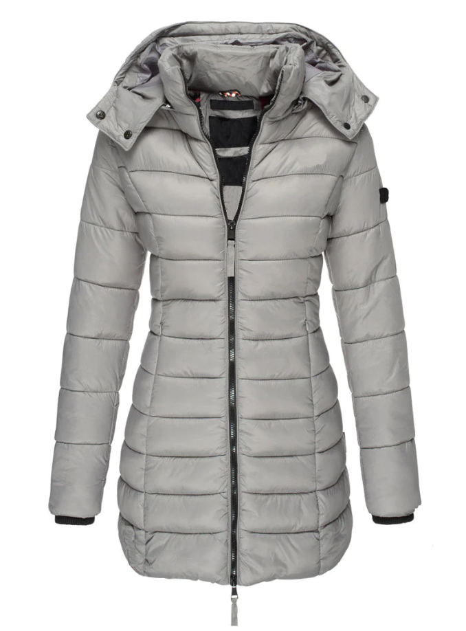 Abrigo de mujer acolchado, ideal para el frío invierno, con capucha y diseño entallado. Comodidad y estilo.