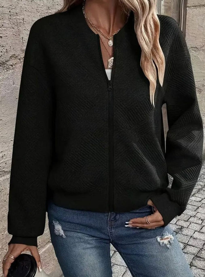 Cárdigan de entretiempo para mujer, diseño bomber de punto texturizado con cremallera.