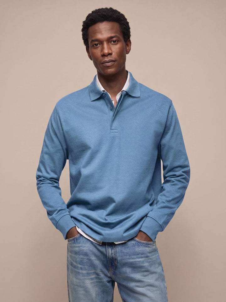 Textura suave del polo de algodón de manga larga, corte clásico. Comodidad y durabilidad para el hombre moderno.