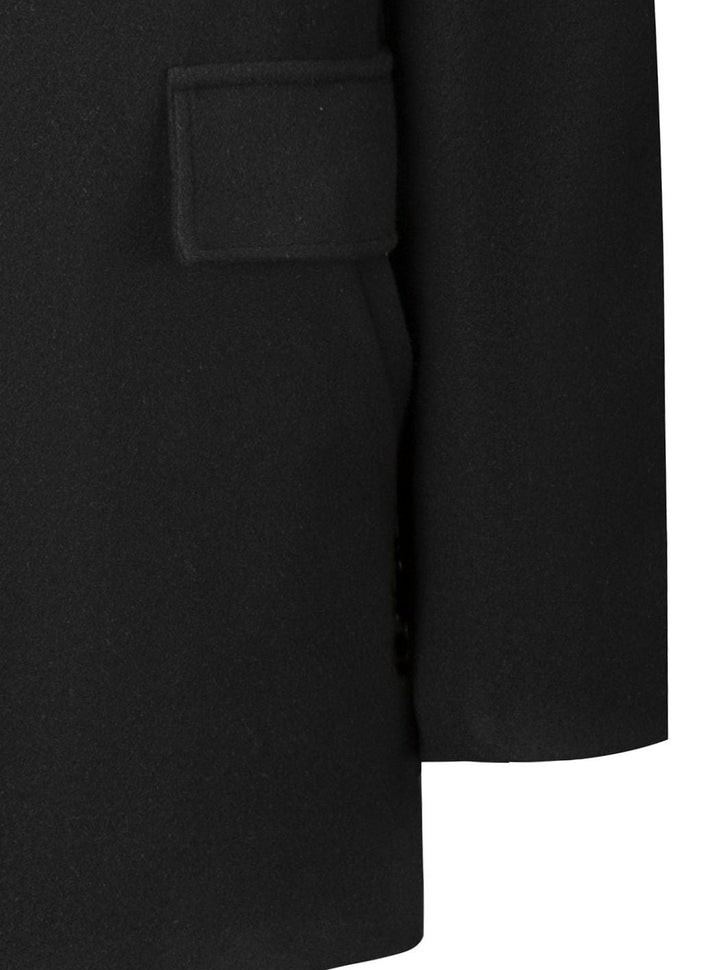 Abrigo de hombre gris oscuro, estilo cruzado y entallado. Ideal para vestir con elegancia en invierno.