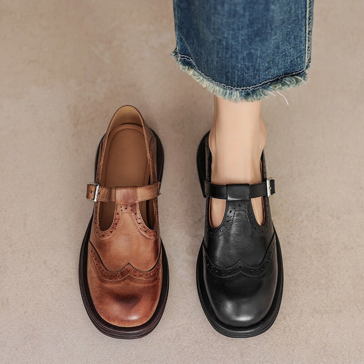 Elegantes zapatos T-strap negros para mujer, estilo retro, versátiles y cómodos.