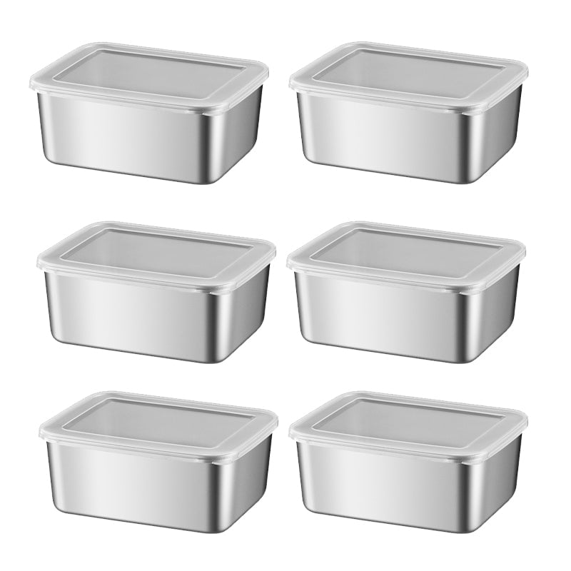 Contenedores de acero inoxidable en refrigerador. Conservación de alimentos eficiente y reutilizable.