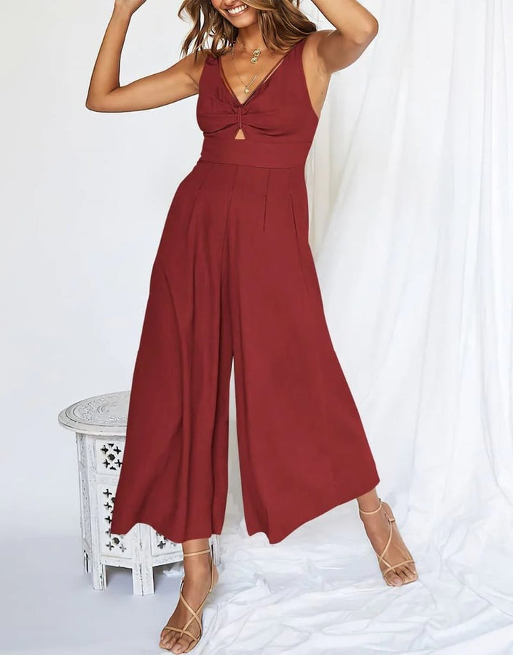 Mono mujer con escote V y pierna ancha. Estilo elegante y cómodo para cualquier evento.