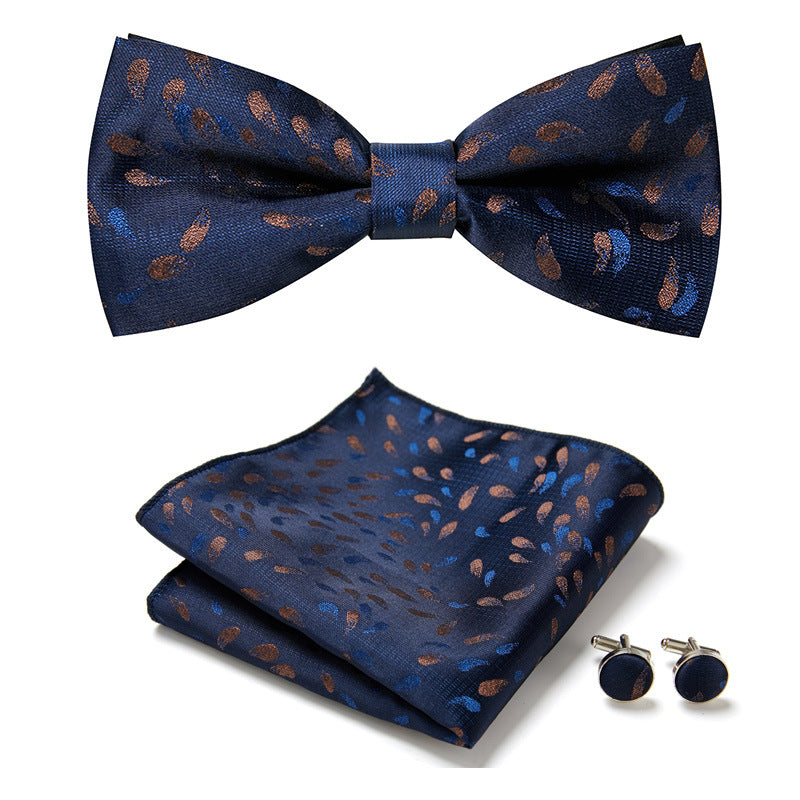 Pañuelo de bolsillo floral a juego con pajarita y gemelos para hombres. [[lstfy-media:4]]