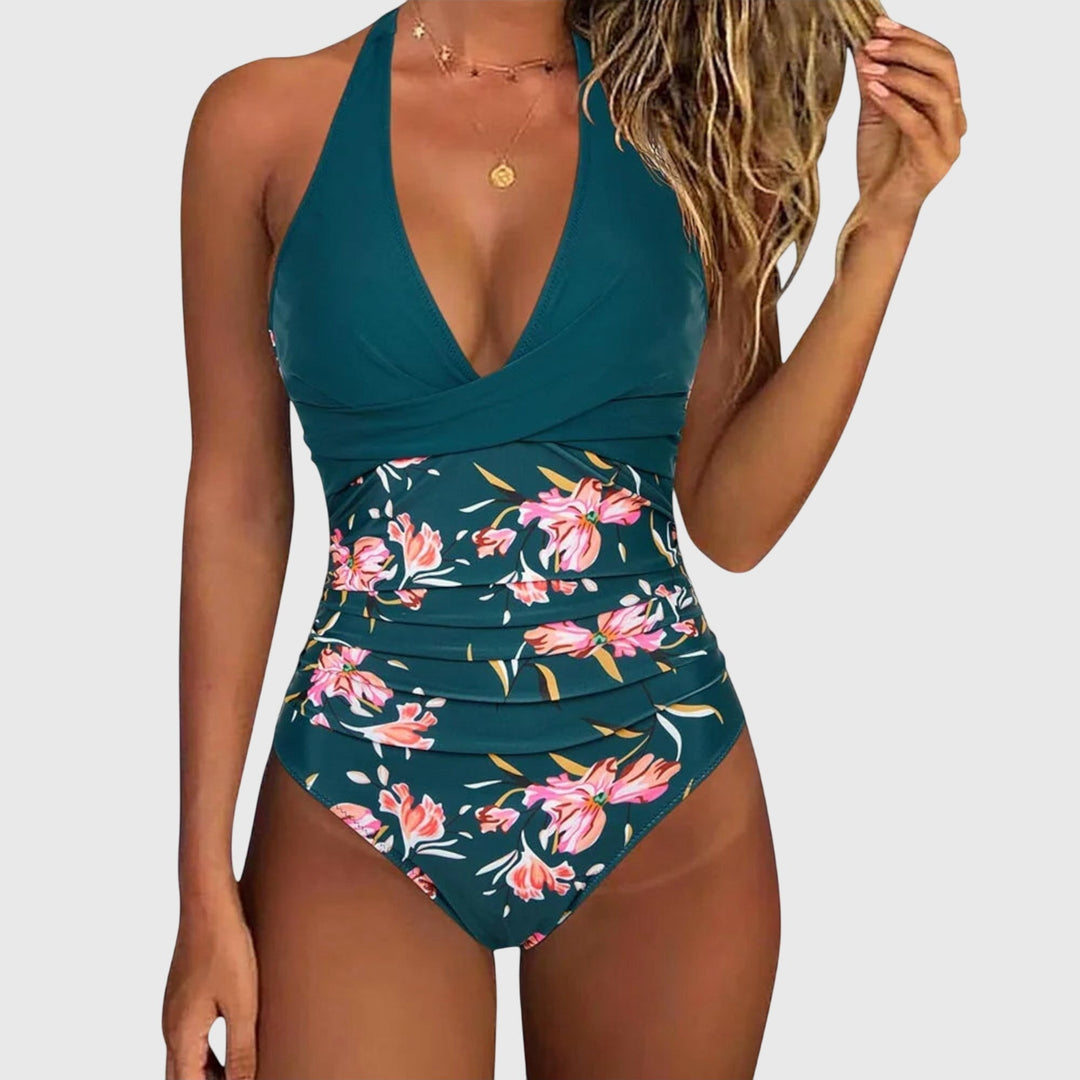 Bañador mujer entero halter, escote V fruncido floral. Estilo moldeador, ideal playa y piscina.