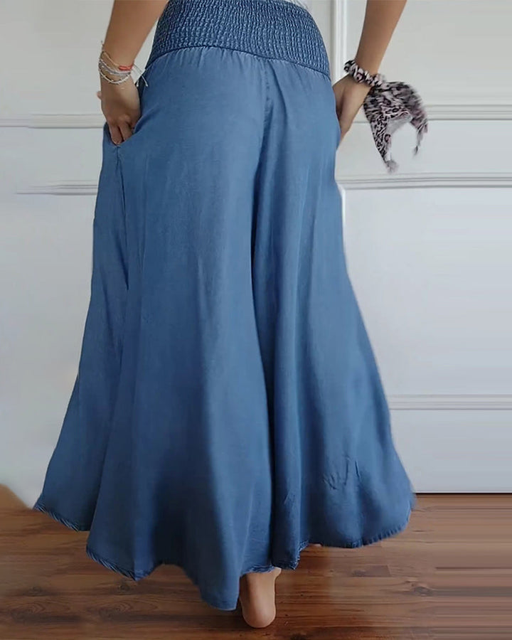 Pantalón de verano para mujer, pierna ancha. Cintura elástica y tejido cómodo. Look casual y chic.