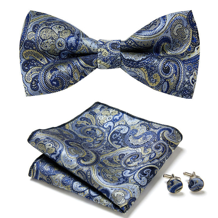 Elegante conjunto de pajarita y pañuelo floral, más gemelos a juego para hombre. [[lstfy-media:22]]