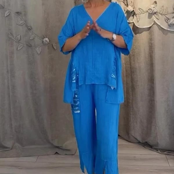 Moda casual de primavera/verano: conjunto fluido de mujer con escote V y pantalones holgados. Estilo cómodo y chic.