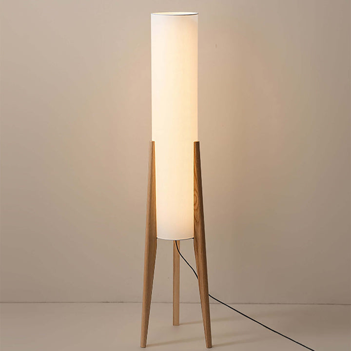 Elegante lámpara de pie de madera sólida, diseño moderno para interiorismo y luz ambiental.
