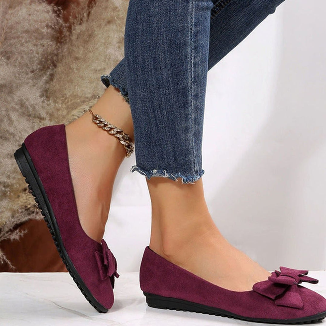 Bailarinas planas Camille acolchadas para mujer, con lazo y diseño slip-on, ideales para confort casual.