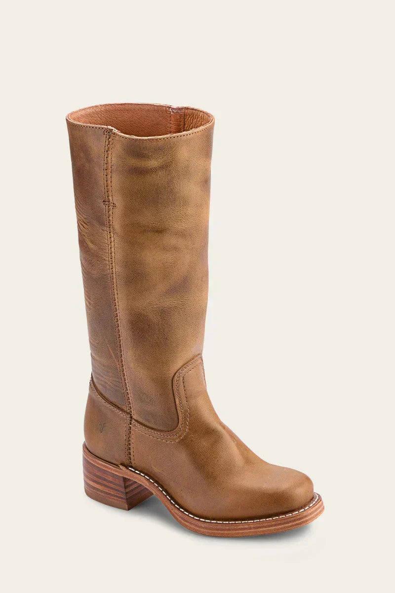 Botines de mujer de cuero flexible y tacón, calzado sofisticado para un look de moda actual.