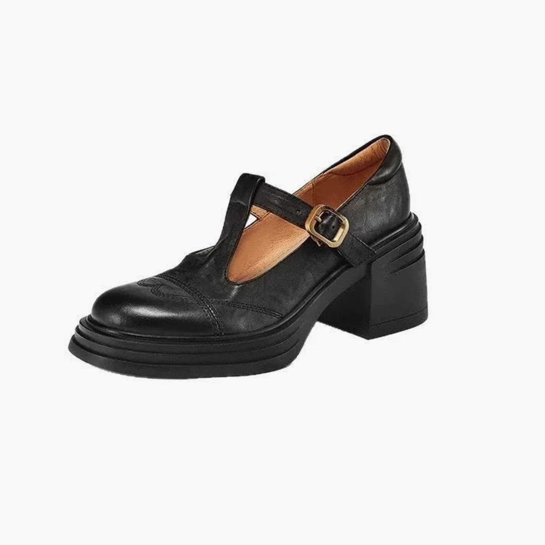 Zapatos de tacón de piel con tira en T y punta redonda. Diseño cómodo con tacón ancho, ideal para estilo oficina.
