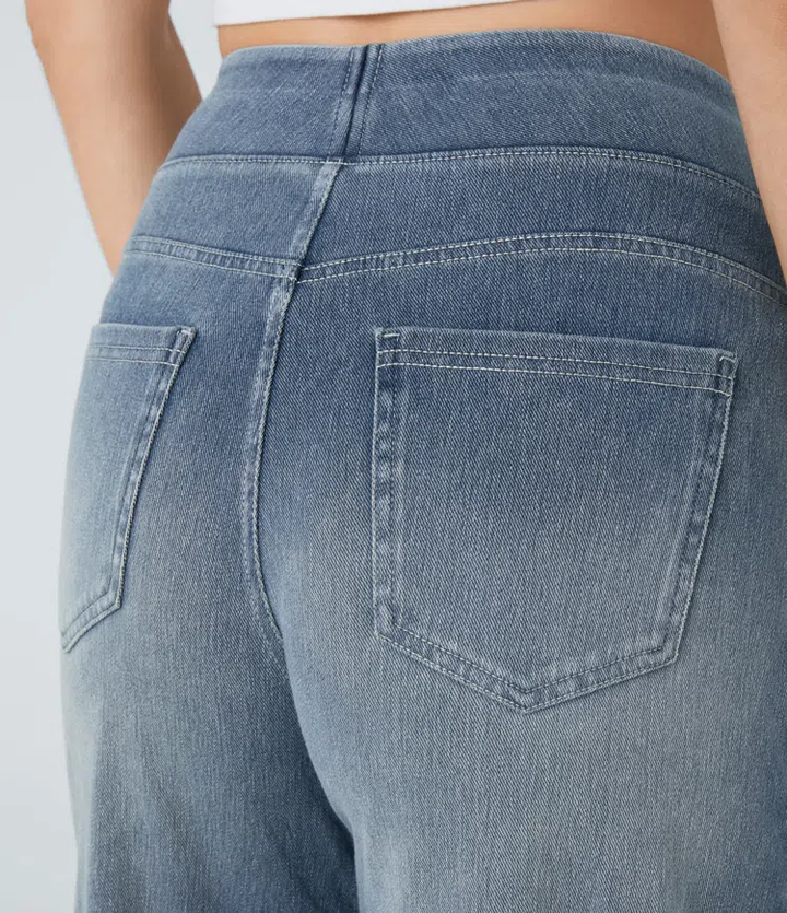 Pantalón jean elástico de mujer, talle alto y pierna ancha. Estilo casual y moderno, silueta moldeadora.
