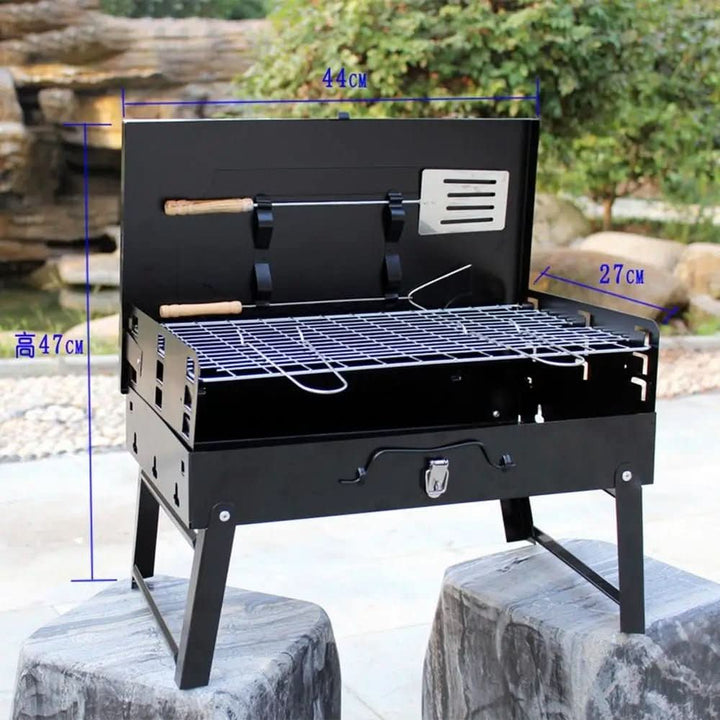 Barbacoa de acero compacta, perfecta para picnic, jardín y eventos al aire libre.