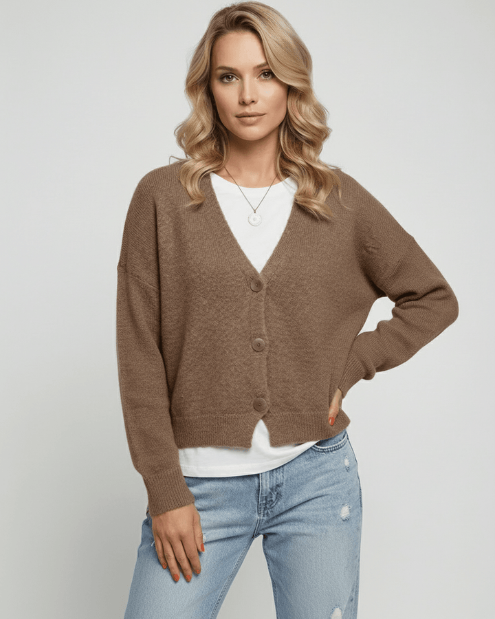 Cárdigan de mujer en celeste, suéter de punto suave y moderno para la temporada de frío.