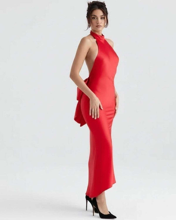 Maxi vestido blanco formal de noche. Diseño asimétrico elegante, perfecto para eventos y celebraciones.