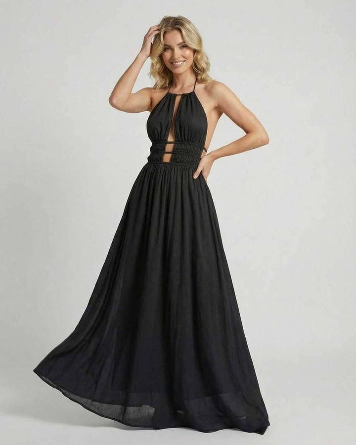 Vestido maxi blanco formal para fiesta o noche. Diseño elegante con cuello halter para mujer.