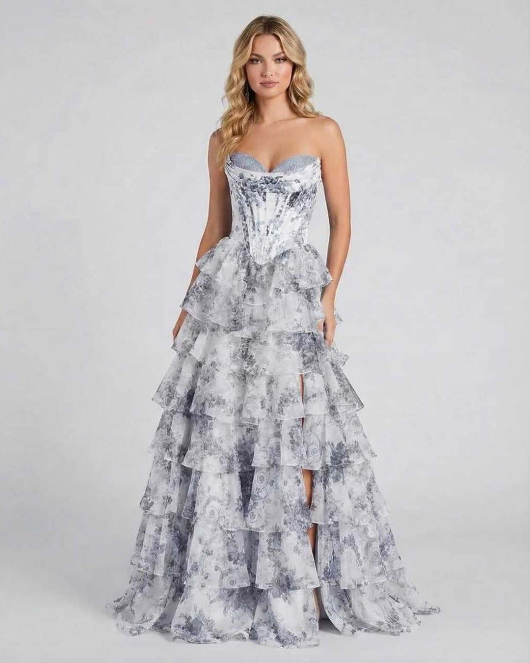 Vestido maxi blanco floral fluido sin mangas, ideal para eventos formales y galas. Elegancia femenina.