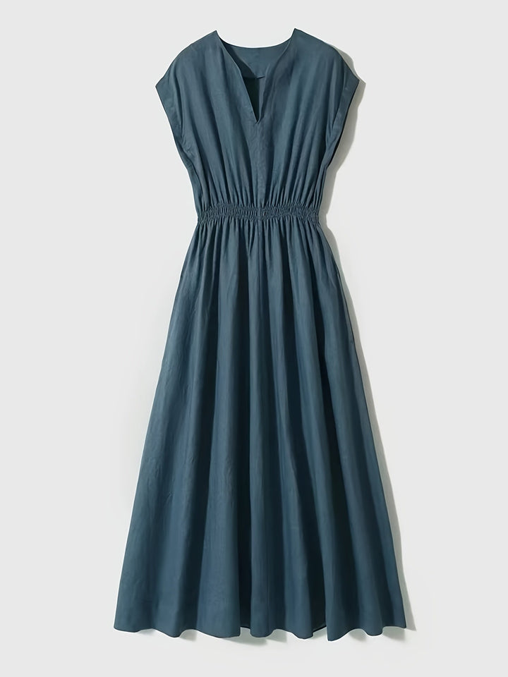 Elegante vestido midi fluido de lino transpirable para mujer en azul marroquí, perfecto para vacaciones.
