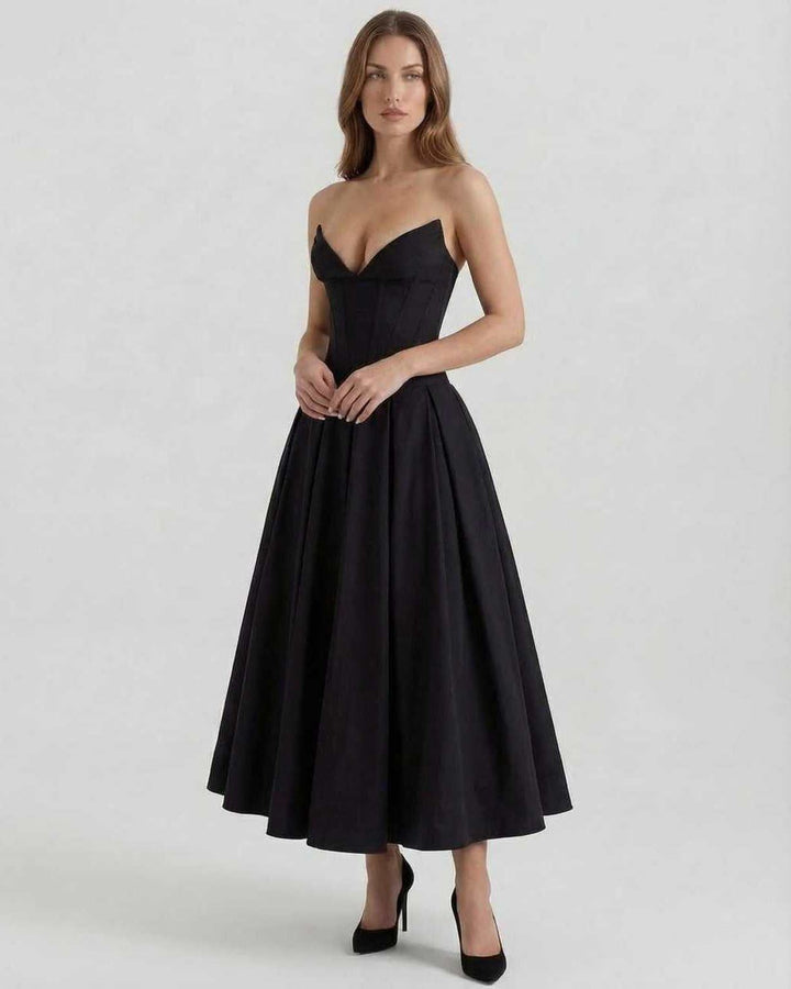 Vestido midi Cleo negro sin tirantes, silueta A hasta el tobillo, elegante y moderno para mujer, moda de fiesta.