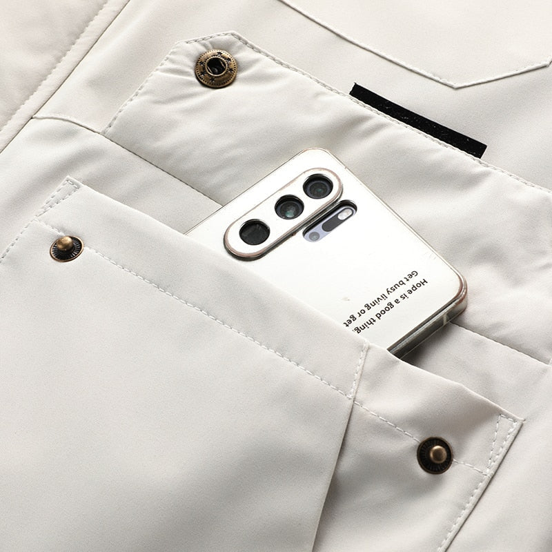 Chaqueta cortavientos ligera para hombre, multibolsillos. Ropa exterior versátil, estilo urbano y viaje.