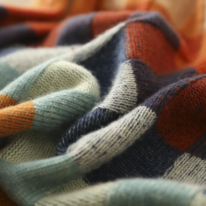 Jersey de invierno multicolor para mujer, cuello alto. Ofrece máxima calidez y confort, un must de moda para otoño.