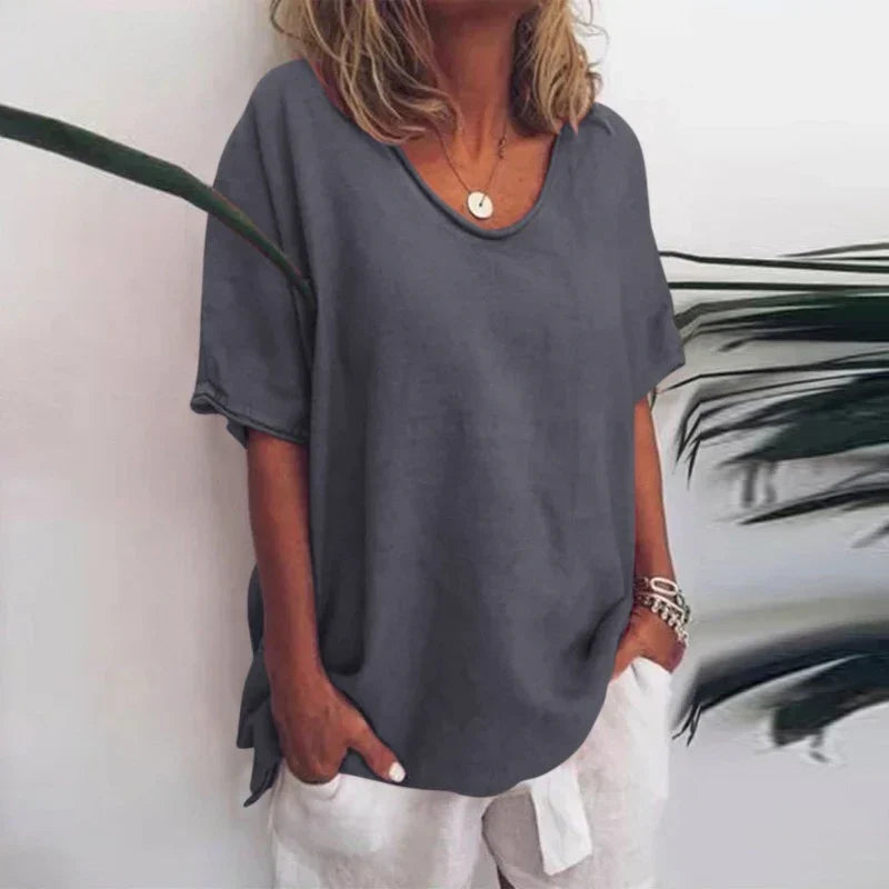 Blusa holgada de mujer con escote en V, ideal para estilo casual y comodidad diaria en primavera-verano.