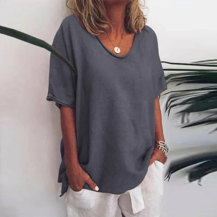 Blusa holgada de mujer con escote en V, ideal para estilo casual y comodidad diaria en primavera-verano.