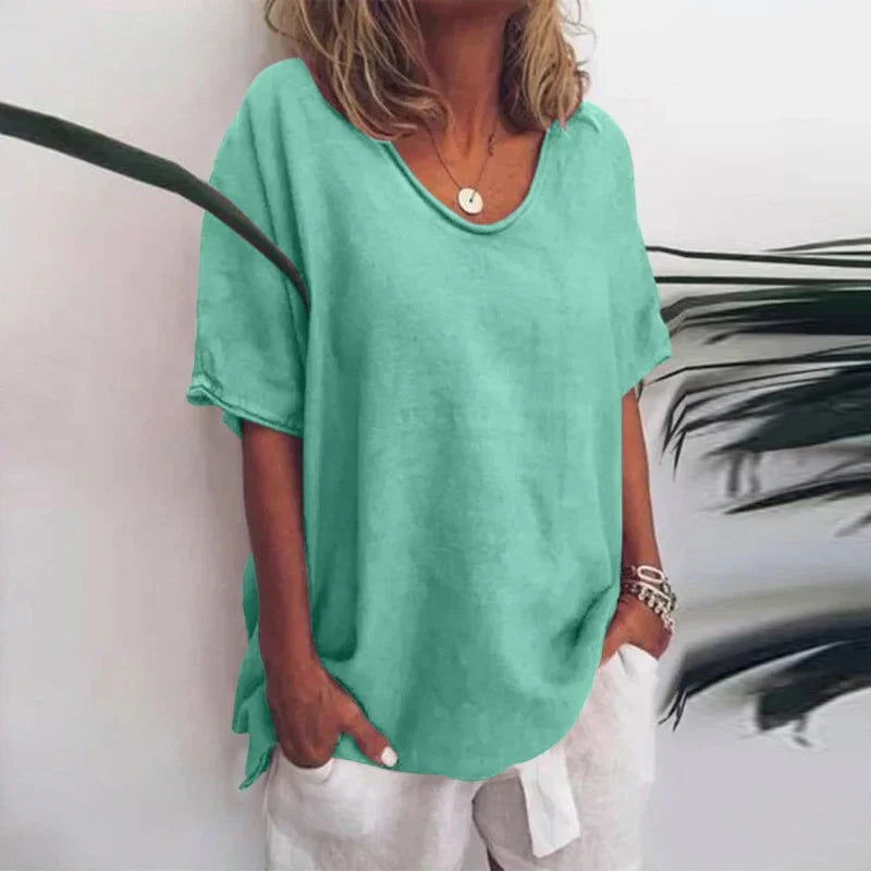 Camiseta holgada de mujer para comodidad diaria. Blusa versátil con escote V, perfecta para primavera y tallas grandes.