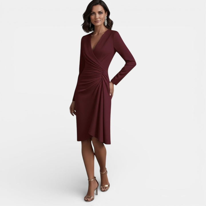 Vestido midi elegante de mujer con escote en V, ideal para fiestas y eventos sofisticados. Línea A.