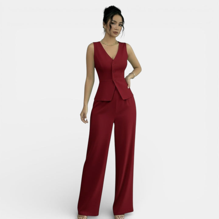 Ropa de oficina negra: conjunto de chaleco y pantalón elegante para mujer, estilo profesional.