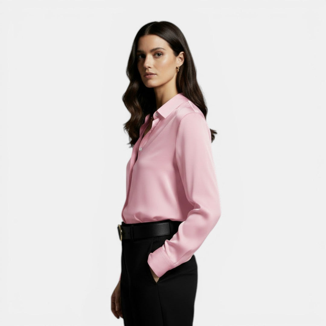 Camisa de mujer holgada, con solapa, botones frontales y manga larga, estilo casual y oficina.