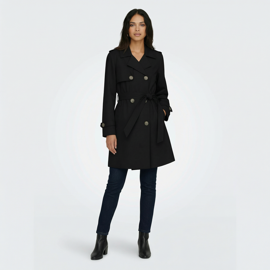 Gabardina mujer moderna, corte midi y doble botonadura. Un básico elegante para tus looks de primavera otoño.