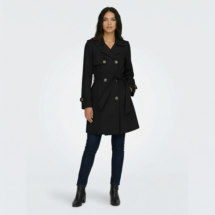 Gabardina mujer moderna, corte midi y doble botonadura. Un básico elegante para tus looks de primavera otoño.