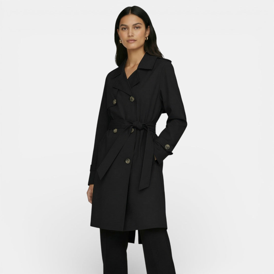 Gabardina de mujer corte midi, doble botonadura. Clásica y elegante para primavera, otoño. Abrigo versátil.