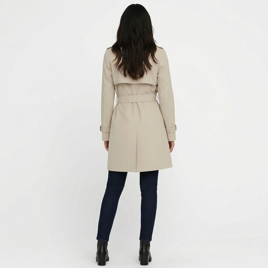 Moda mujer: gabardina elegante midi doble botonadura, ideal para un estilo sofisticado en entretiempo.